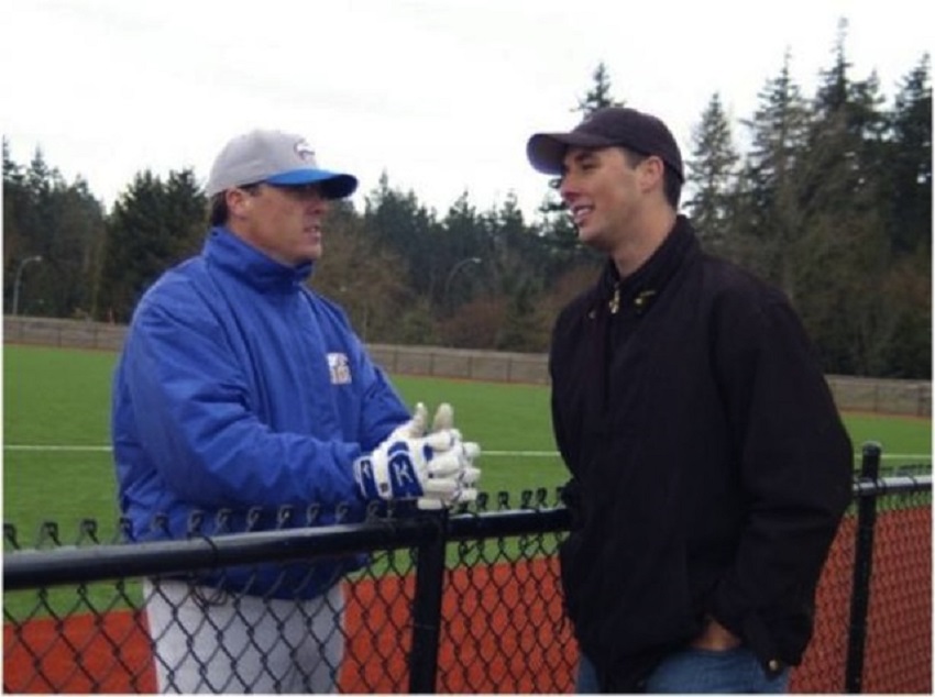 Former University of British Columbia Thunderbirds coach Terry McKaig chats with alumni Jeff Francis. Photo: Robert Broughton. 