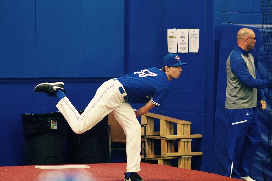 RHP Jordan Balazovic (Mississauga, Ont.) of the Ontario Blue Jays threw a bullpen with pitching coach Mike Steed watching.