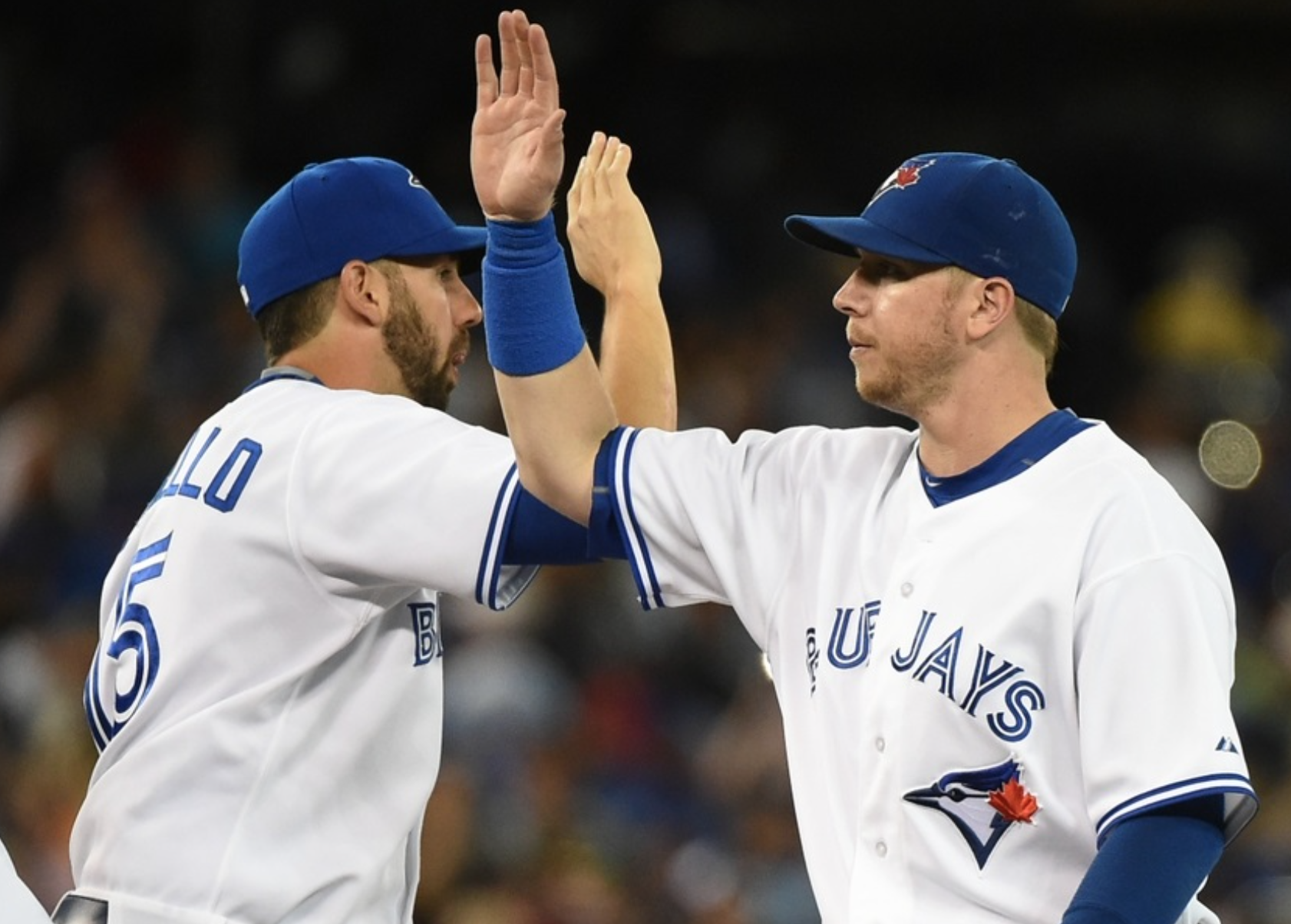 CHRIS COLABELLO, LEFT, AND JUSTIN SMOAK ARE BOTH VYING FOR PLAYING TIME AT FIRST BASE WITH THE BLUE JAYS. 