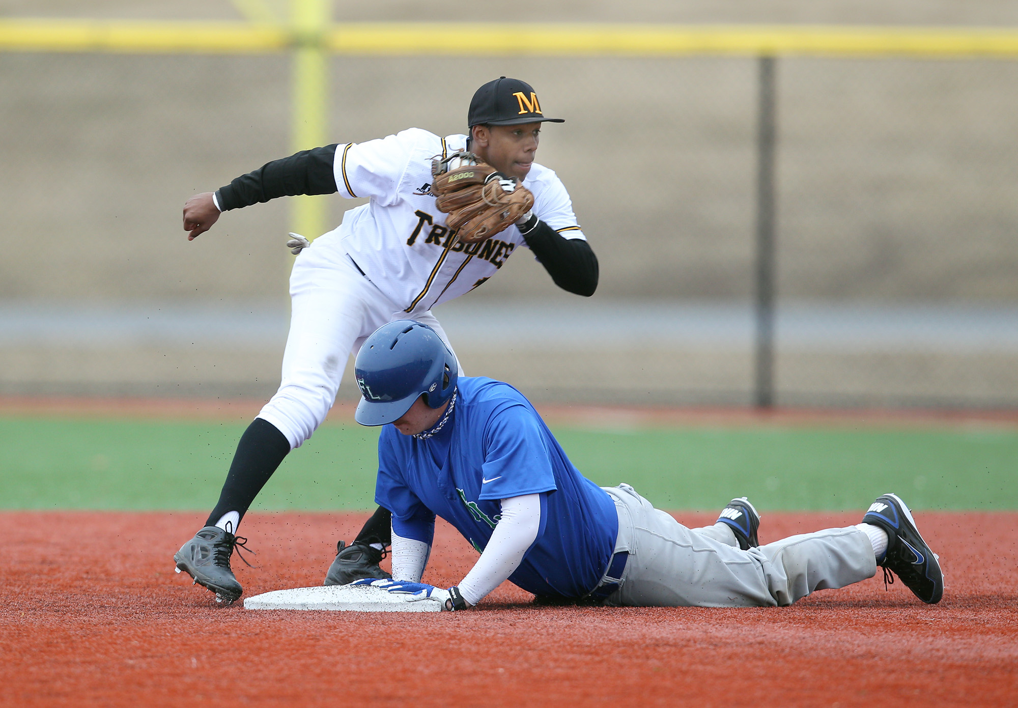 SS Connor Lewis, Monroe, apllies the tag.