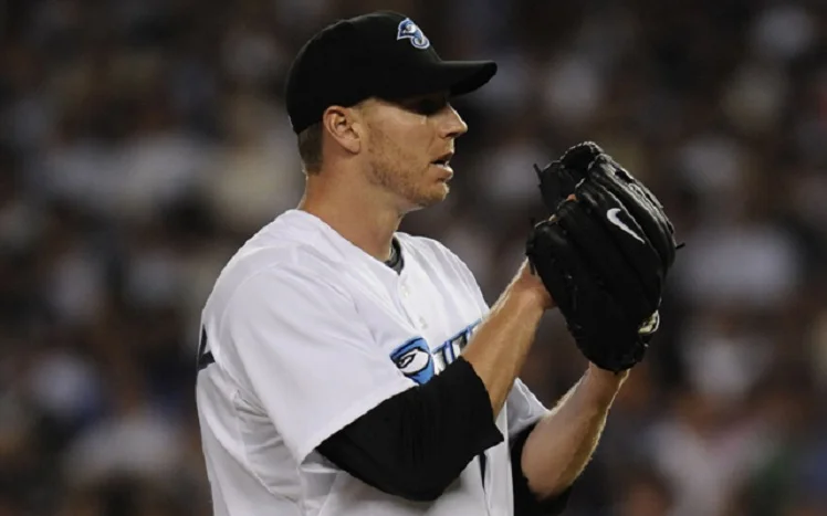 Glove lyrics "a genuine cowhide, Rawlings pro special, 1 autographed by Roy Halladay"