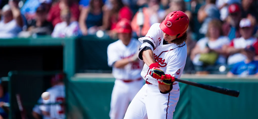 Dawgs score in bunches, hold on for late-game victory