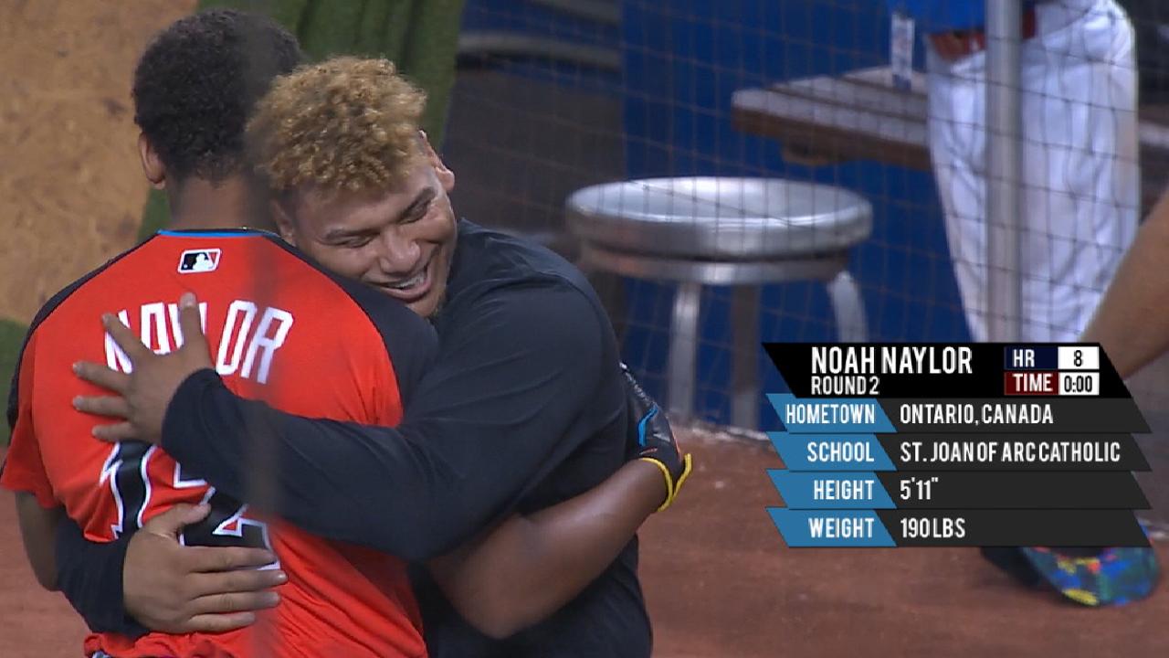 The Brothers Naylor:Noah finished his round at the All-Star junior Home Run Derby and is hugged by his older brother Josh in Miami last July.