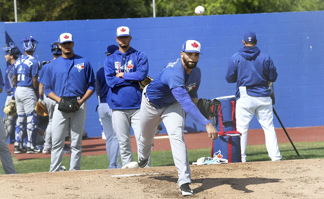 Almonte transitions from outfield to the mound