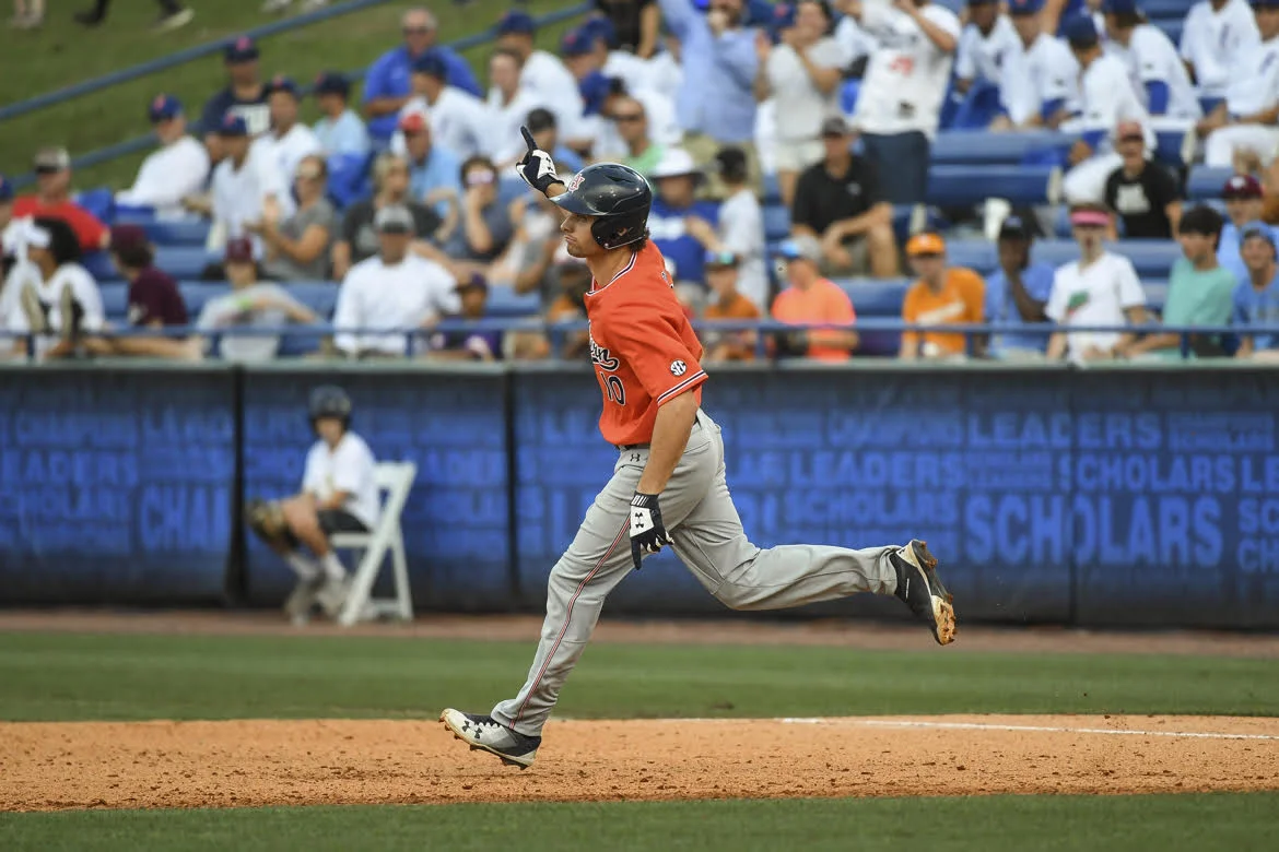 Julien's ninth-inning slam assures Auburn win over Ole Miss 
