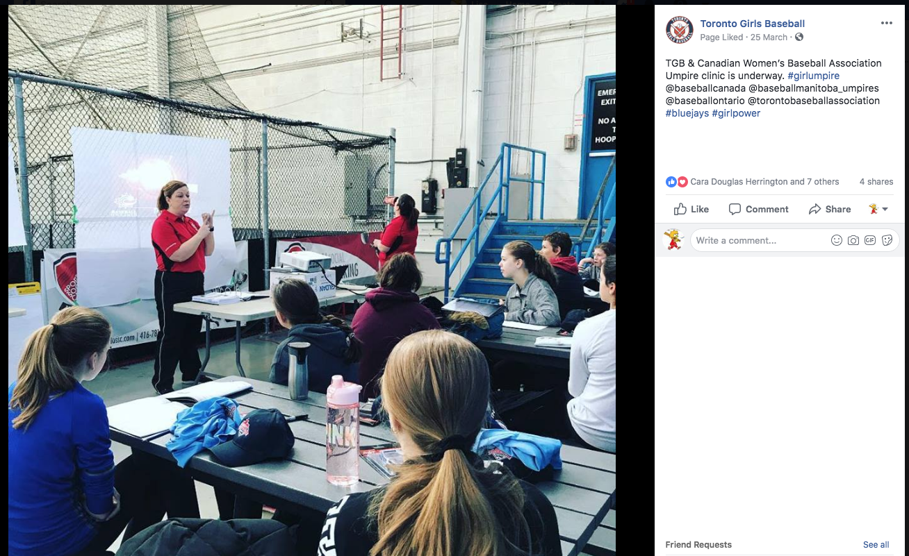 Lisa Turbitt is shown here presenting at an umpire's clinic for the Toronto Girls Baseball League.