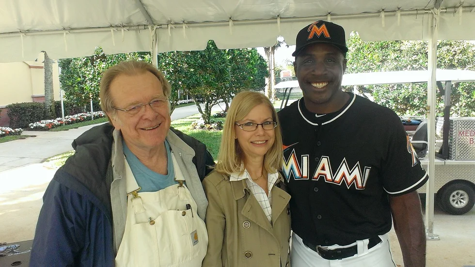 Sam Bat president and co-owner Arlene Anderson (middle) is shown here with Sam Holman (left) and former big league slugger Barry Bonds (right).