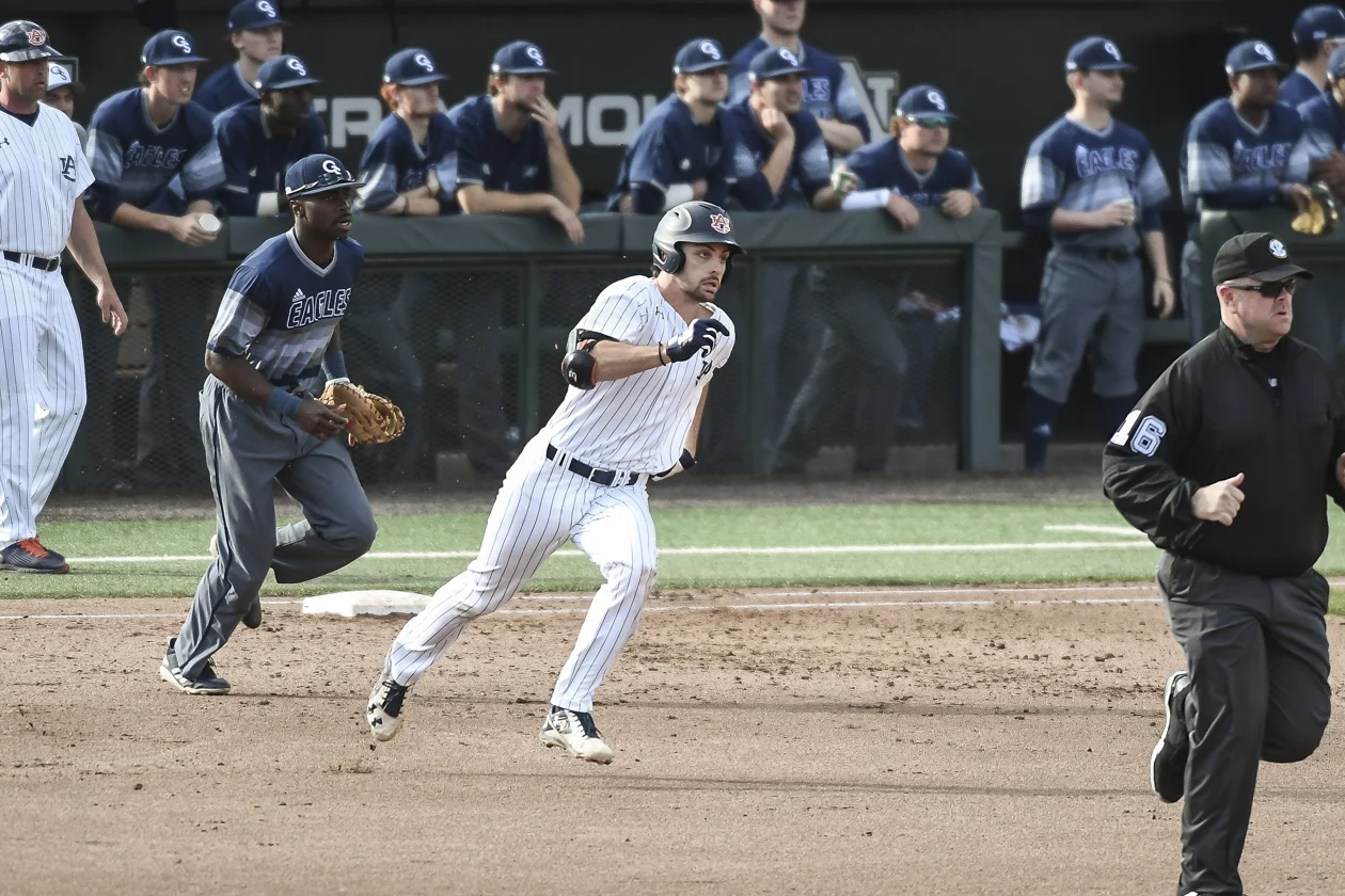Canadian Julien drives in three in Auburn's extra-inning loss 