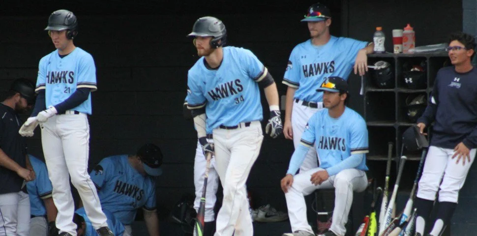Victoria Mariners alum Tyler Schindel (Victoria, B.C.) (centre) was 6-for-10 (.600 batting average) for San Diego Christian.