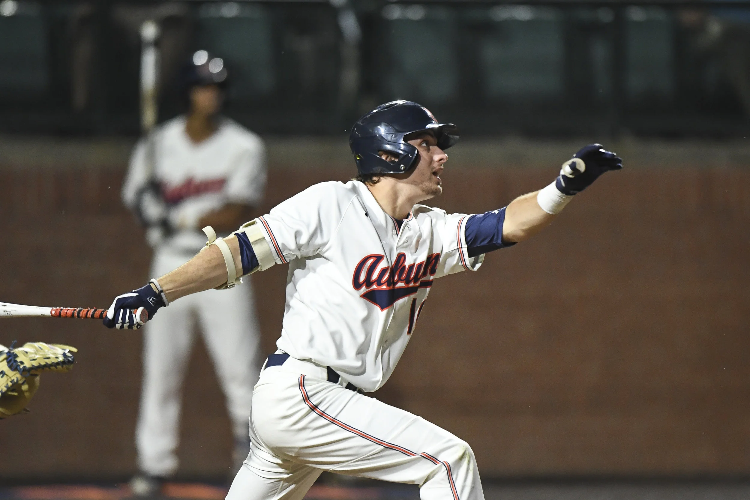 Julien homers, drives in four to lead Auburn to win