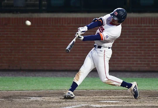 Julien has three hits to help Auburn advance to College World Series