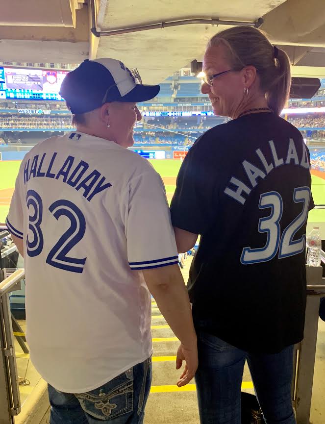 Merinda Halladay, right, sister of the first Blue Jays homegrown Hall of Fame inductee RHP Roy Halladay and her wife Kelly were two of the seven members of the Halladay clan who dropped by the Rogers Centre Monday night.