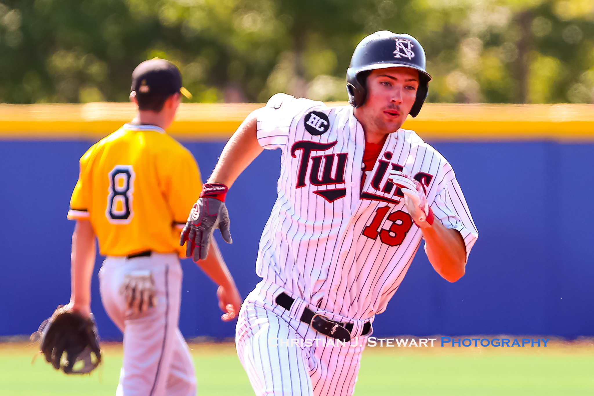 Adam Maier sprints around the bases. He would score three times and add a triple in Sunday’s win. Photo: Christian J. Stewart.