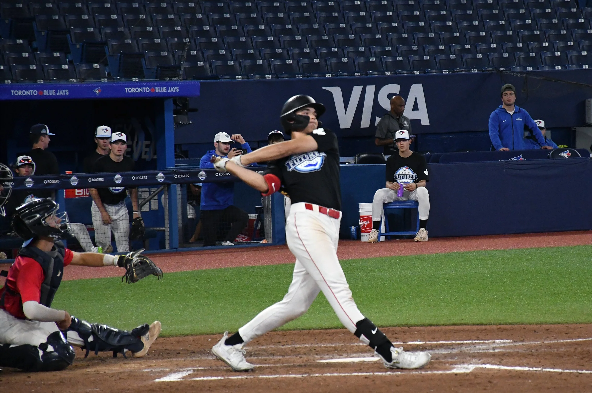 Piasentin's two-run single lifts Team Black to comeback win
