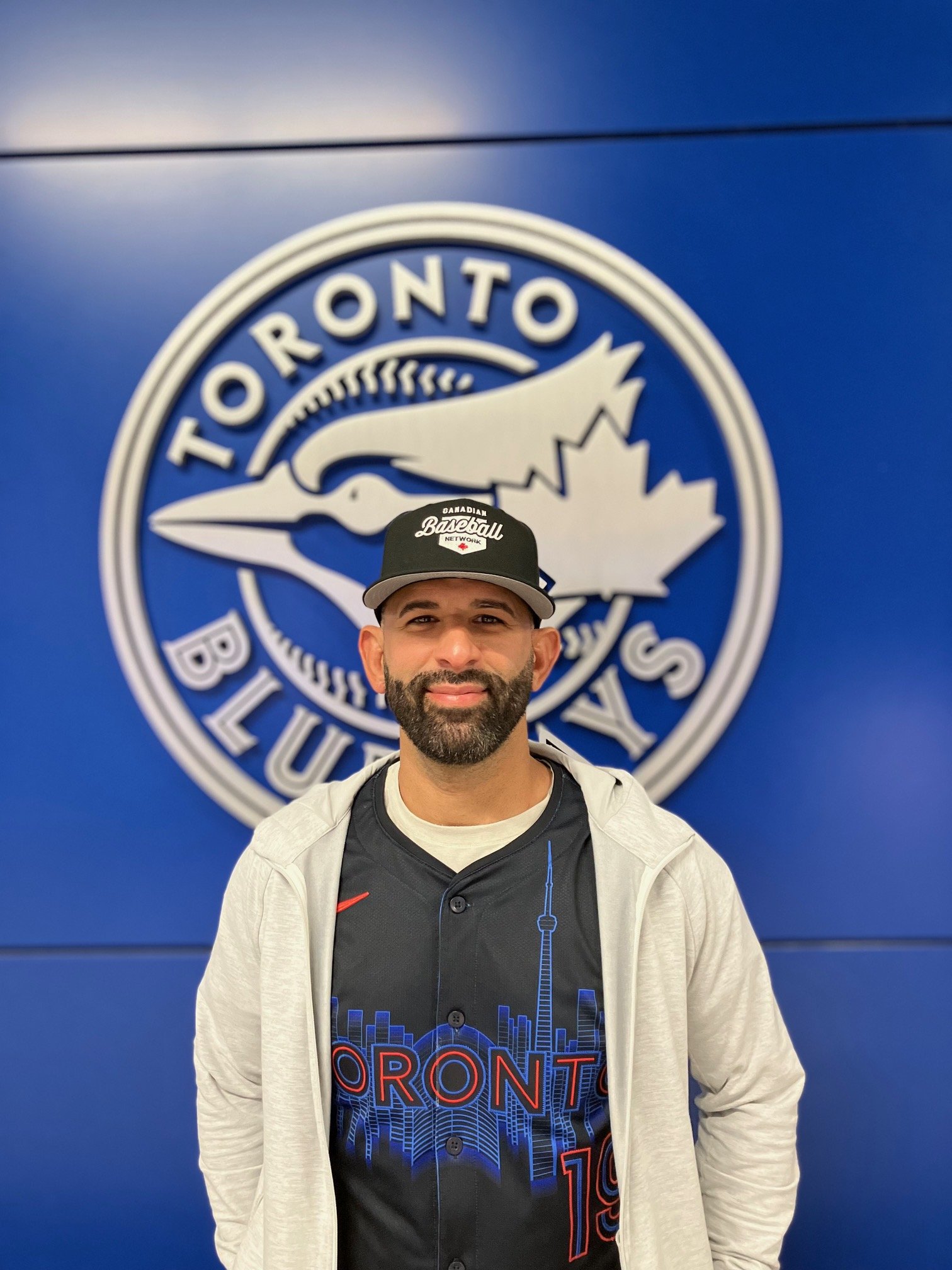 Elliott: Soccer owner Bautista connects in BP, with new uniform and cap