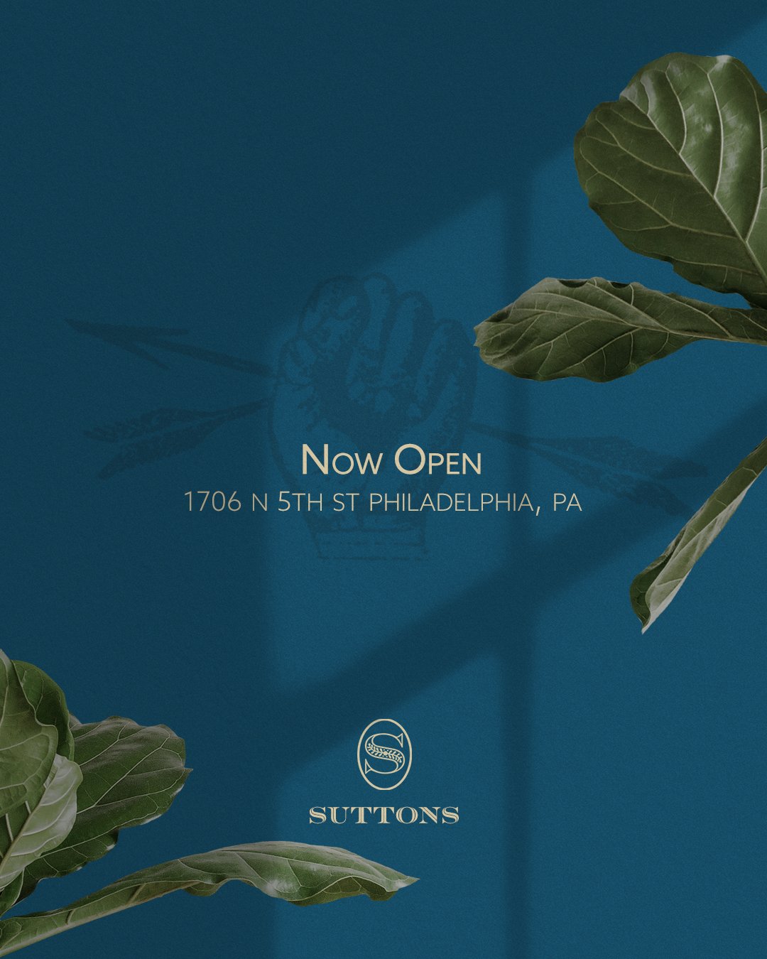 Suttons Logo fist arrows- now open.jpg