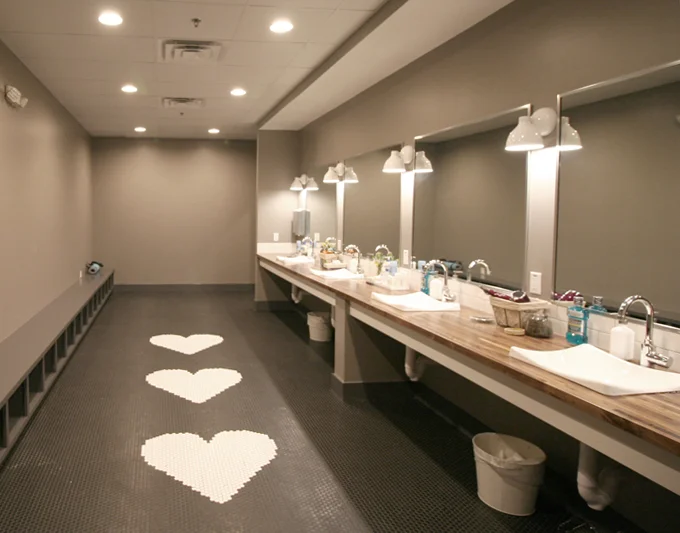 Sources | Tile: 1" Hex Matte in Black and White - Daltile , Countertops: Walnut butcher block - Floor Decor , Sinks: White Demi Lav - Kohler, Faucets: Grohe , Sconces: Contour Single Sconce -West Elm