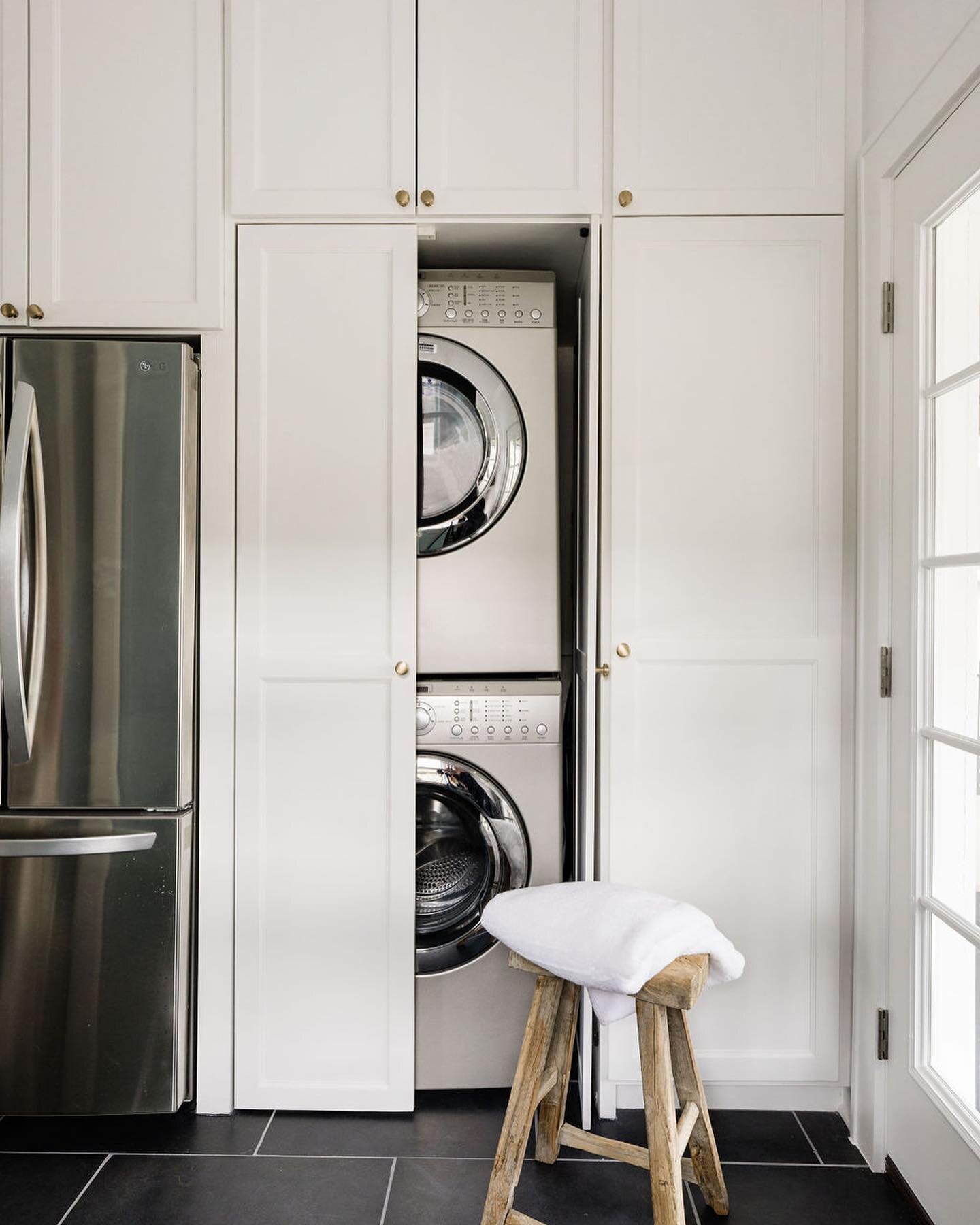 If you have ever lived in one of Houston&rsquo;s little historic bungalows you know they can be big on charm but small on space. We needed a better solution for fitting laundry into this kitchen so it could be hidden away and this floor to ceiling &l