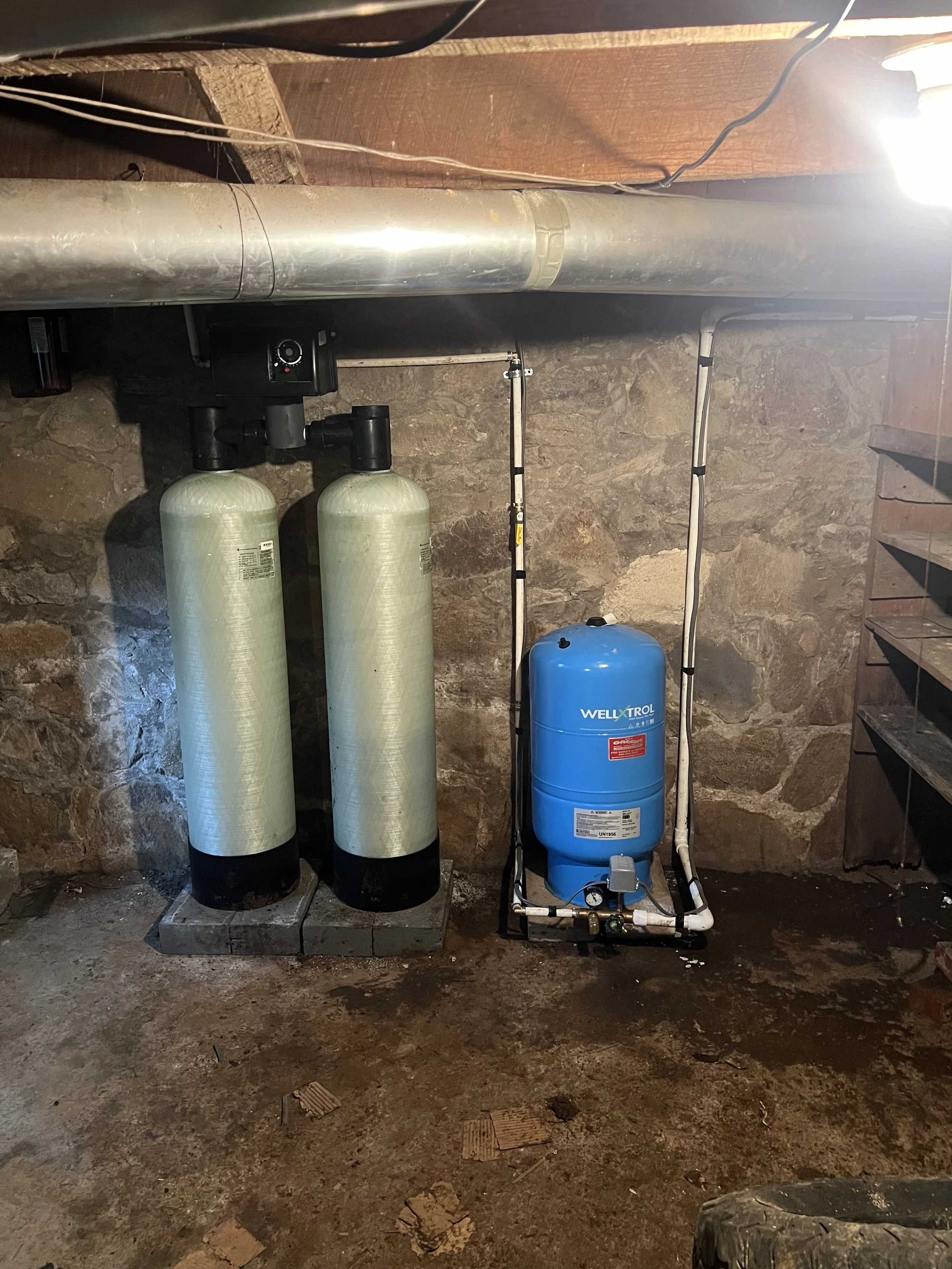 Filtration tanks installed under house to filter Iron