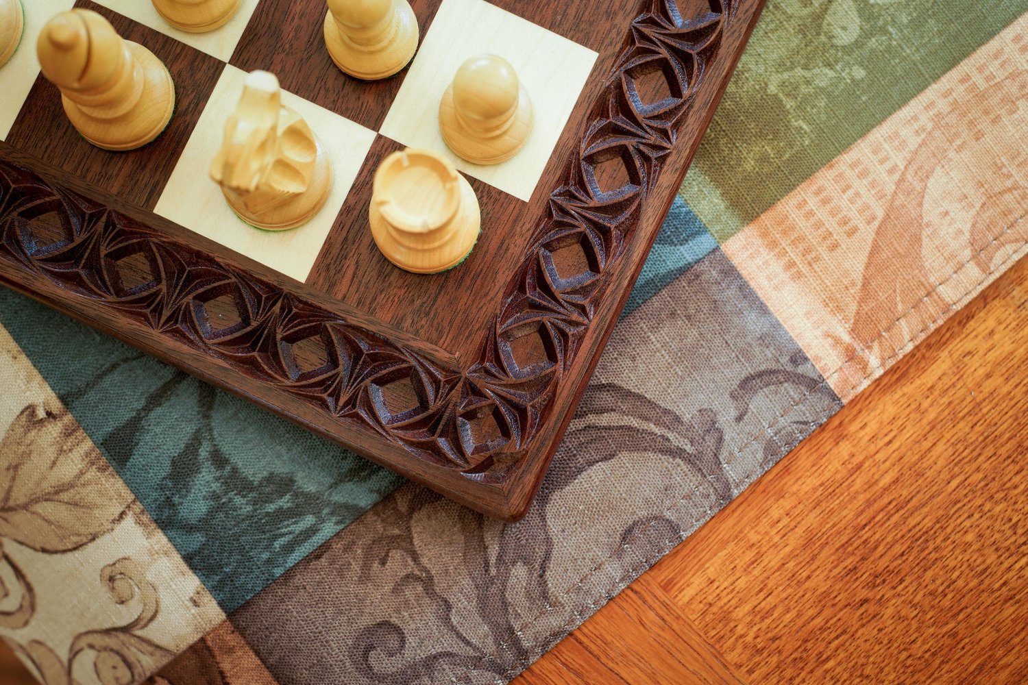 Tournament size wooden chess board with carved border and wooden pieces —  Three Trees Workshop