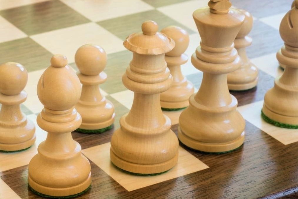 Tournament size wooden chess board with carved border and wooden pieces —  Three Trees Workshop