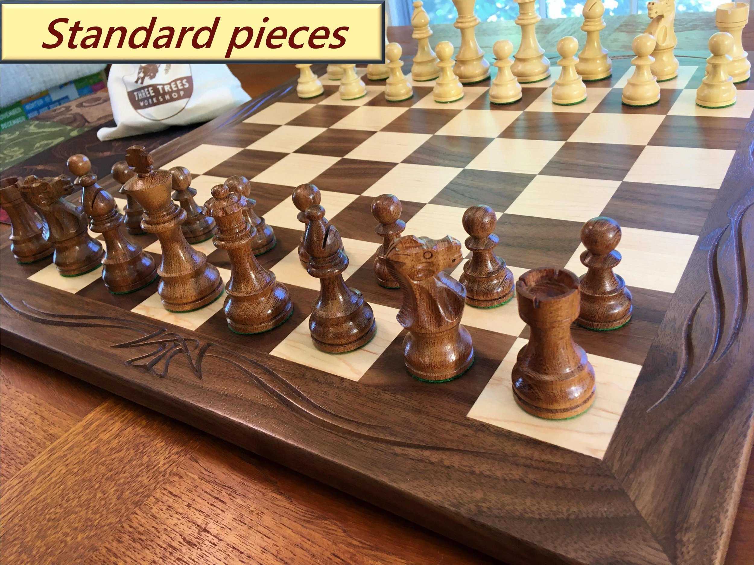 Tournament size wooden chess board with carved border and wooden pieces —  Three Trees Workshop