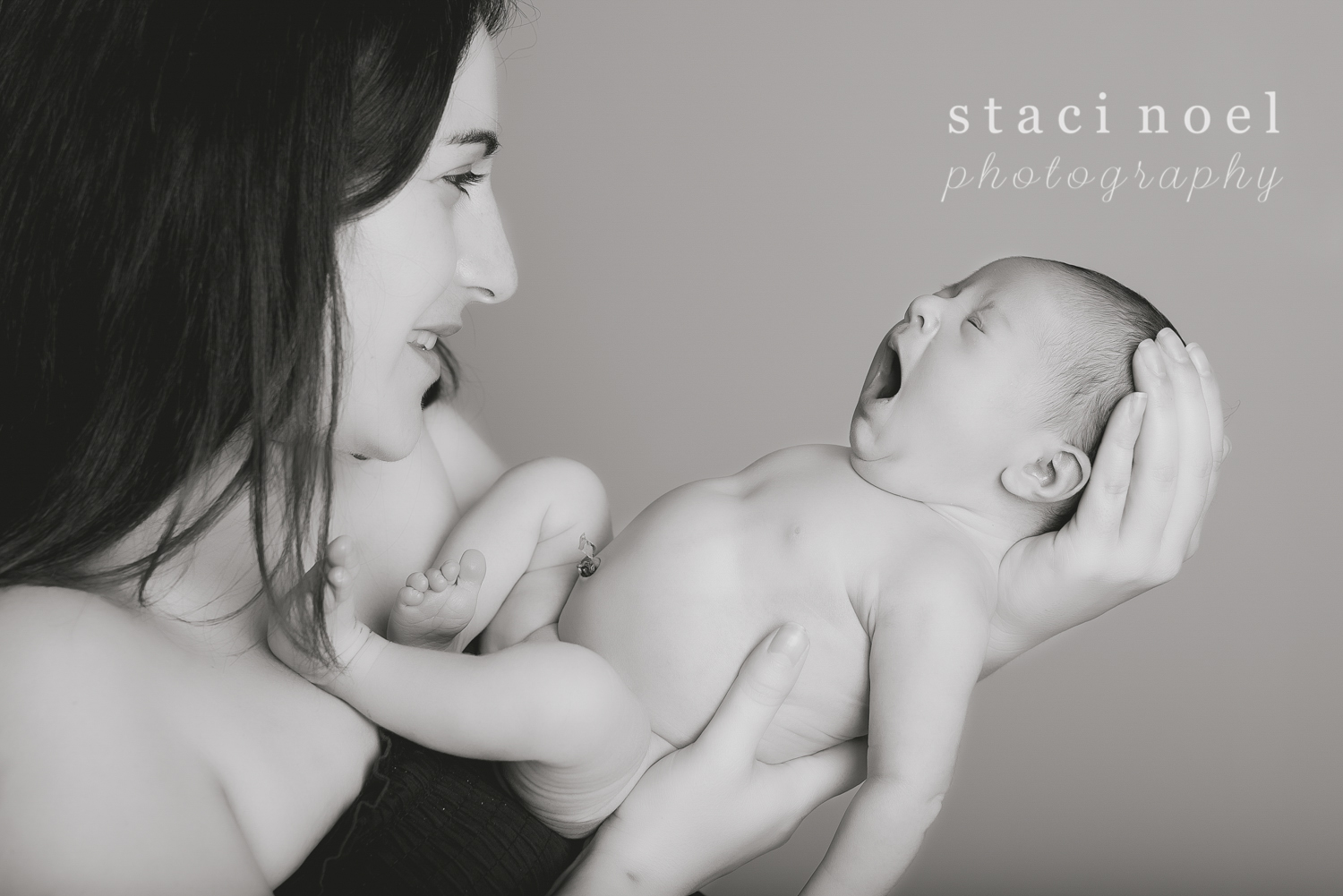 Indian Land SC newborn baby girl photographed by Staci Noel Photography in black and white yawning