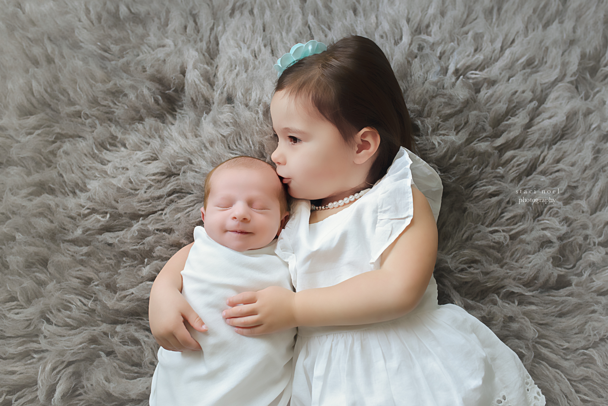 charlotte newborn and sister photograph