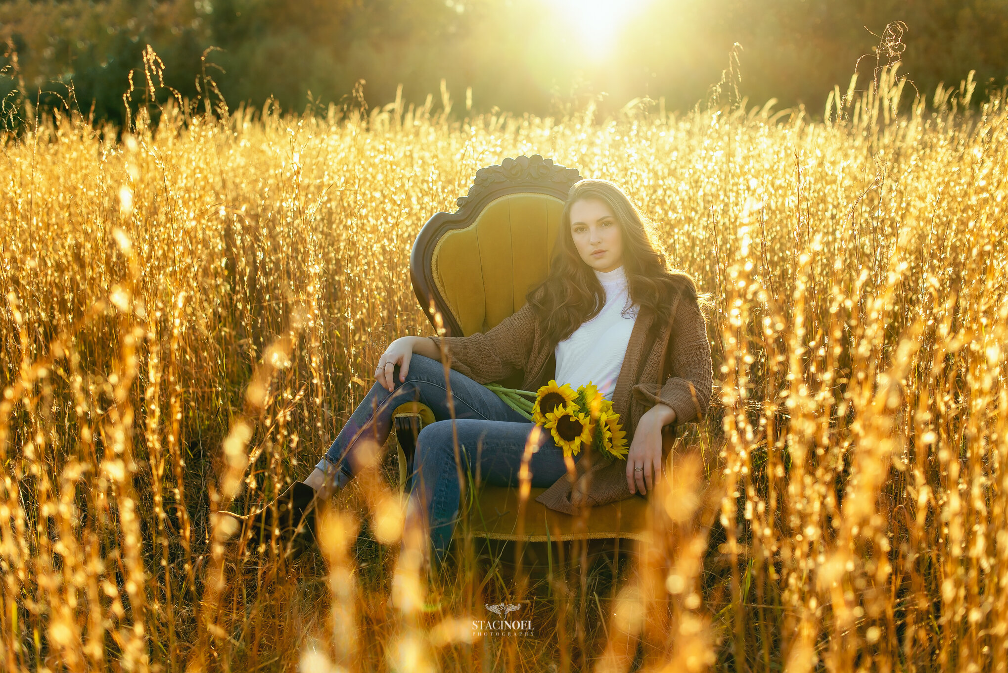  Staci noel photography photographs hickory ridge senior girl for senior portraits outside in natural light in field with tall grass and sunset 