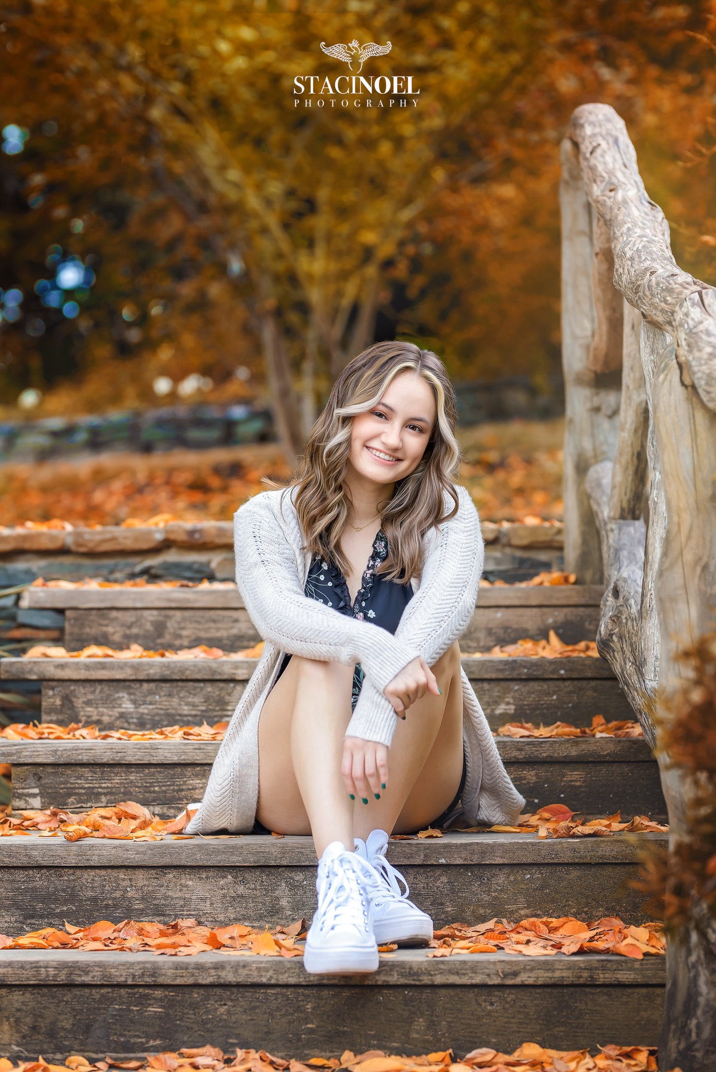 Charlotte senior photographer Staci Noel photography captures a fall senior session at UNCC botanical gardens with autumn colors and high school senior girl in beautiful outdoor setting