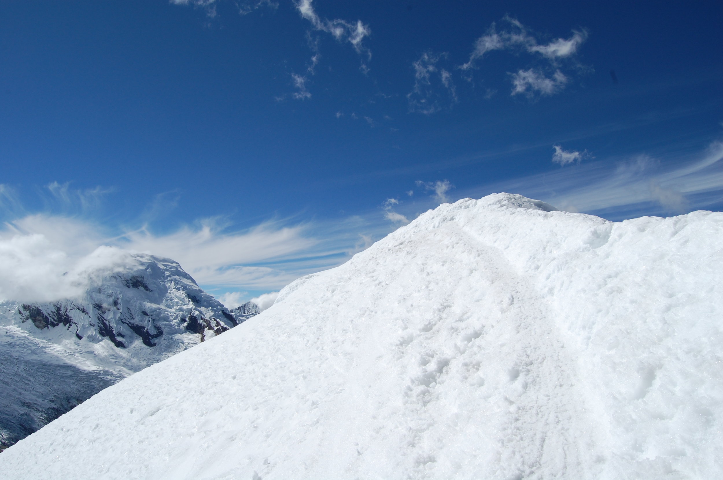 Tiny, steep summit on Ishinca, Cordillera Blanca, Peru