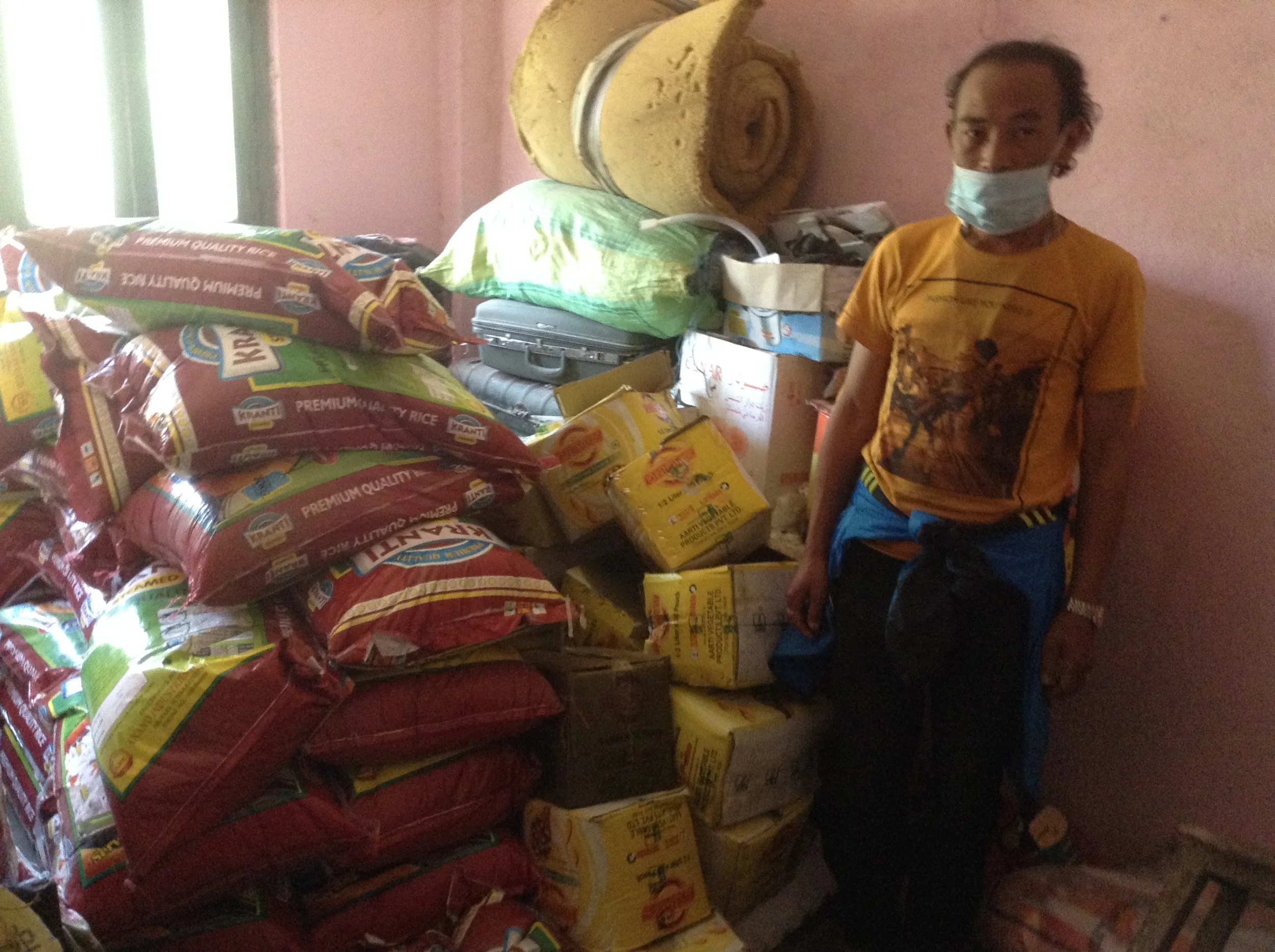 SUman Lama, OUr Sankhu Relief Center Coordinator attending to the supply Depot