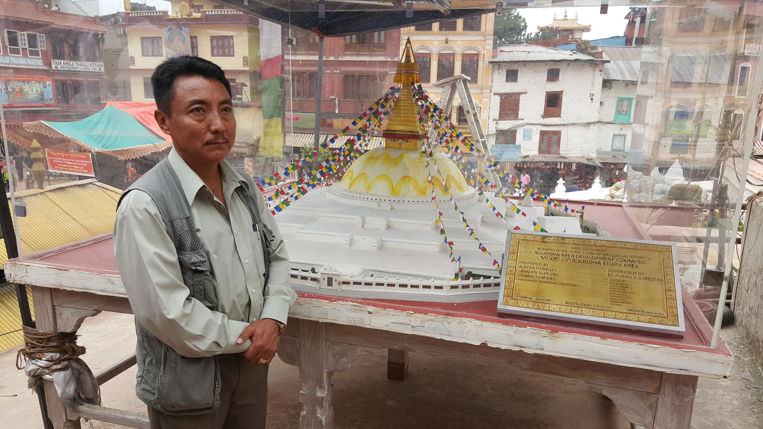A model of the entire stupa with Kirin Lama of the Gyang Guthi