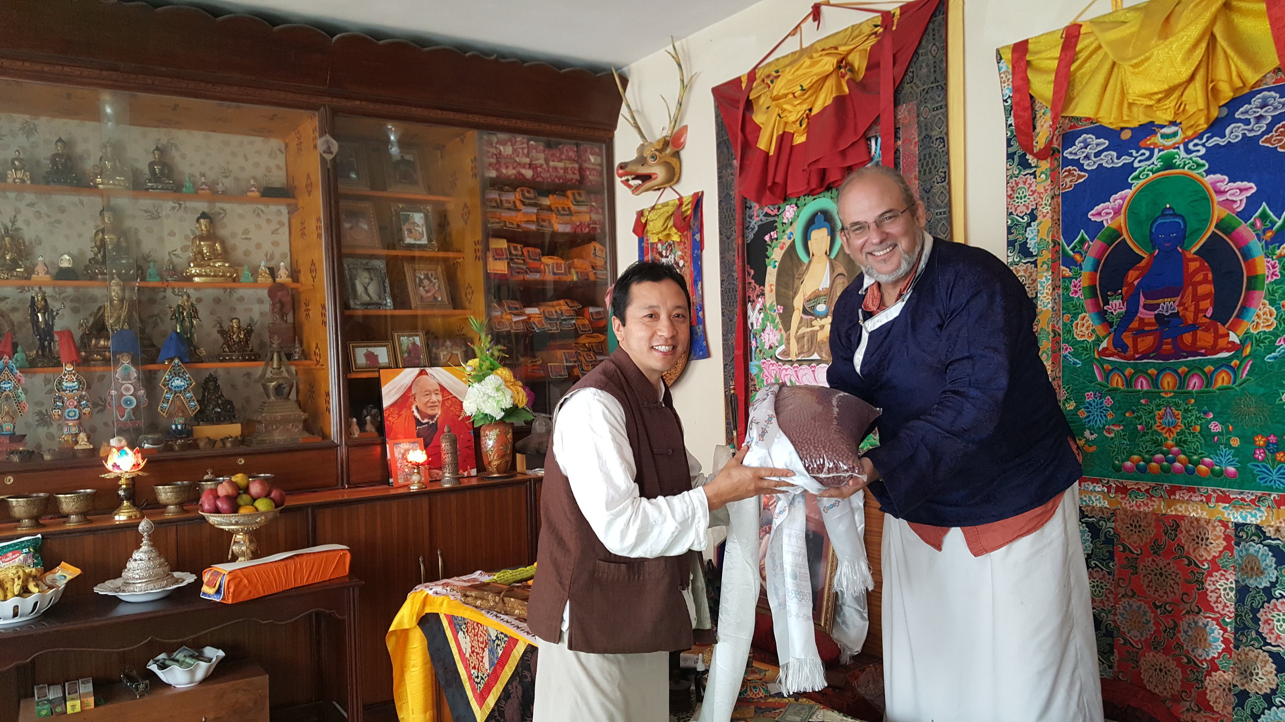 Amchi Sherab handing over Tseril to Lama Rangbar