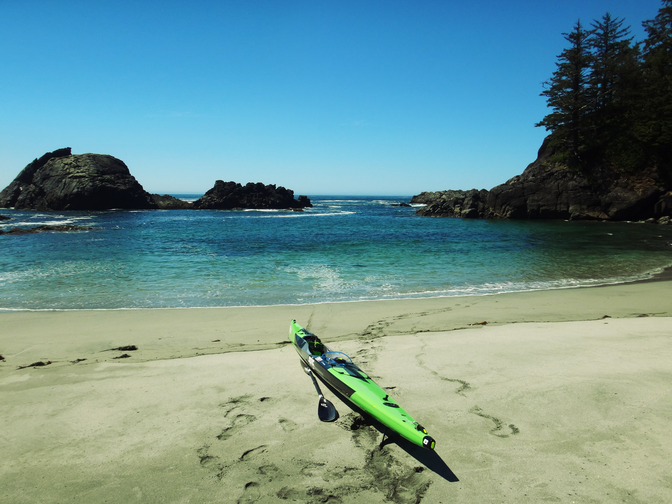 Quick lunch break and changing my water bags. The number of beaches sheltered by reefs is remarkable, but sometimes getting past the reefs can be a bit hectic with crashing waves and plenty of rebound to test your skills. 