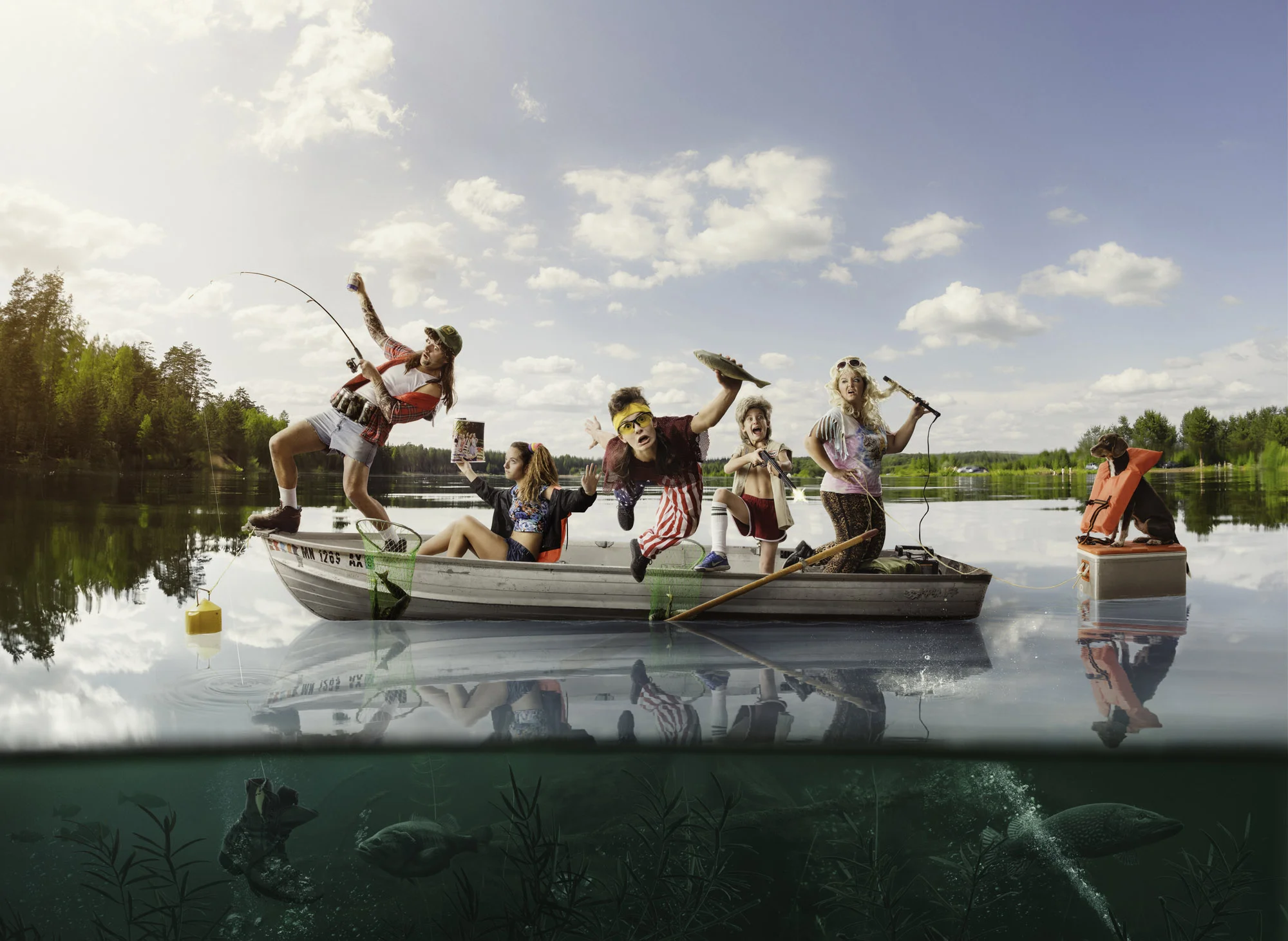 Redneck Klatt family on fishing boat with dog floating behind on beer cooler - Photographic World Cup 2019 Team USA representative