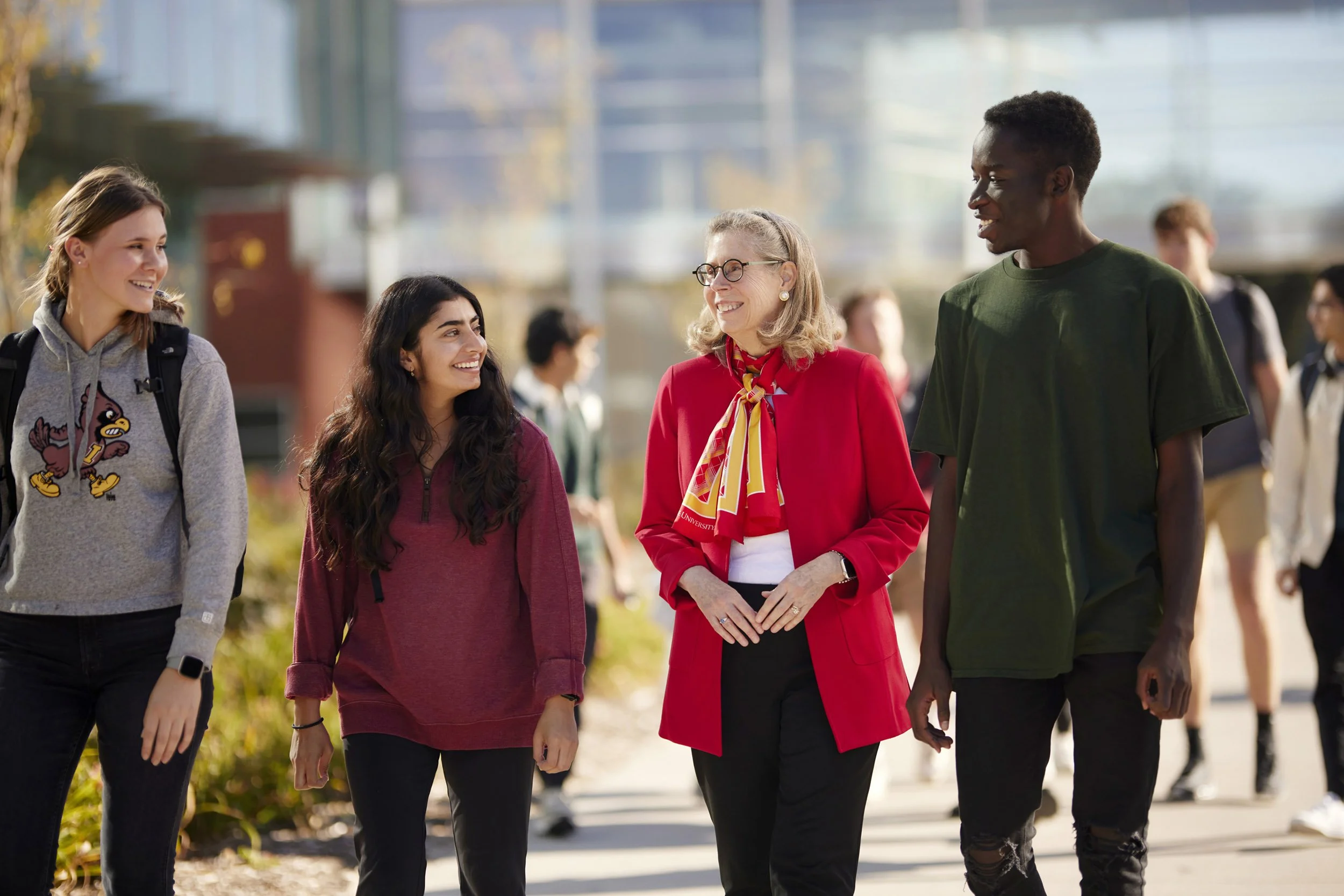 Iowa State University President Wendy Wintersteen engageing with students on campus in front of the Student Innovation Center.JPG