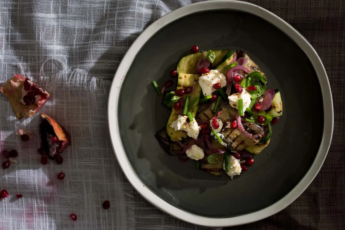 Grilled eggplant and zucchini salad with pomegranate, fresh herbs and Labna