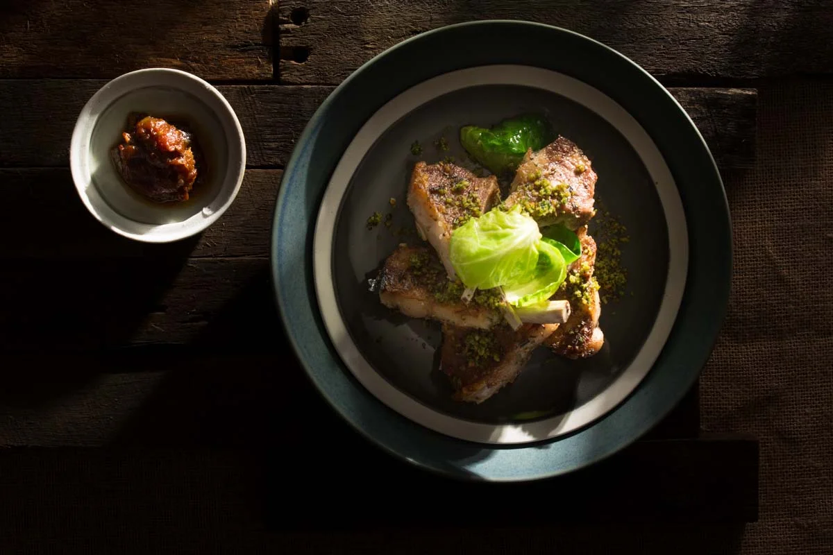 Grilled lamb cutlets with brussels sprouts, gramolata crumbs and tomato chutney
