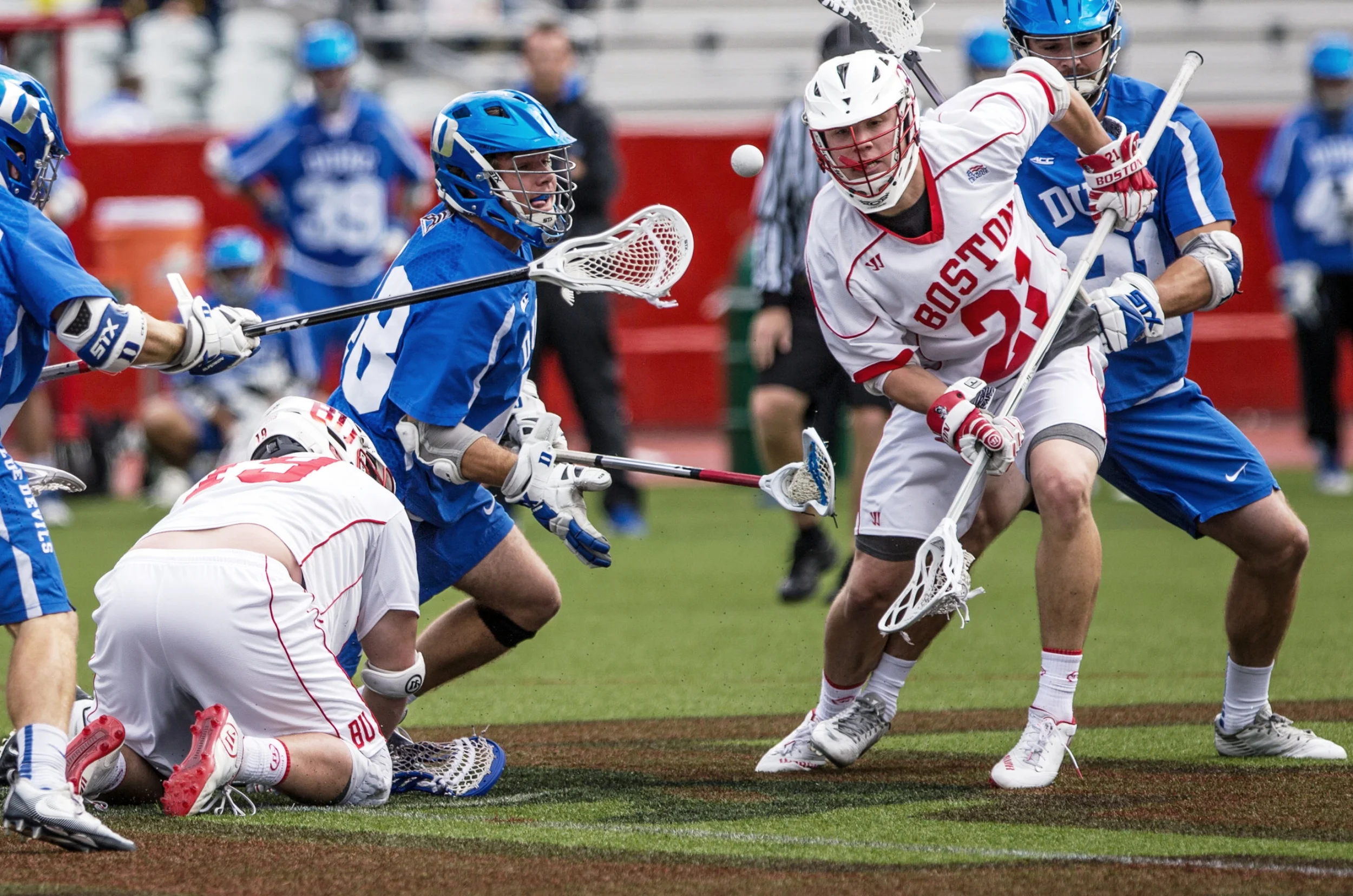 Duke University and Boston University players, including BU junior Greg Wozniak (front right), battle for possession during BU's final men's lacrosse game of the season at Nickerson Field, Boston, Mass., Sunday, May 5, 2016. The Terriers fell to Duke 15-8.