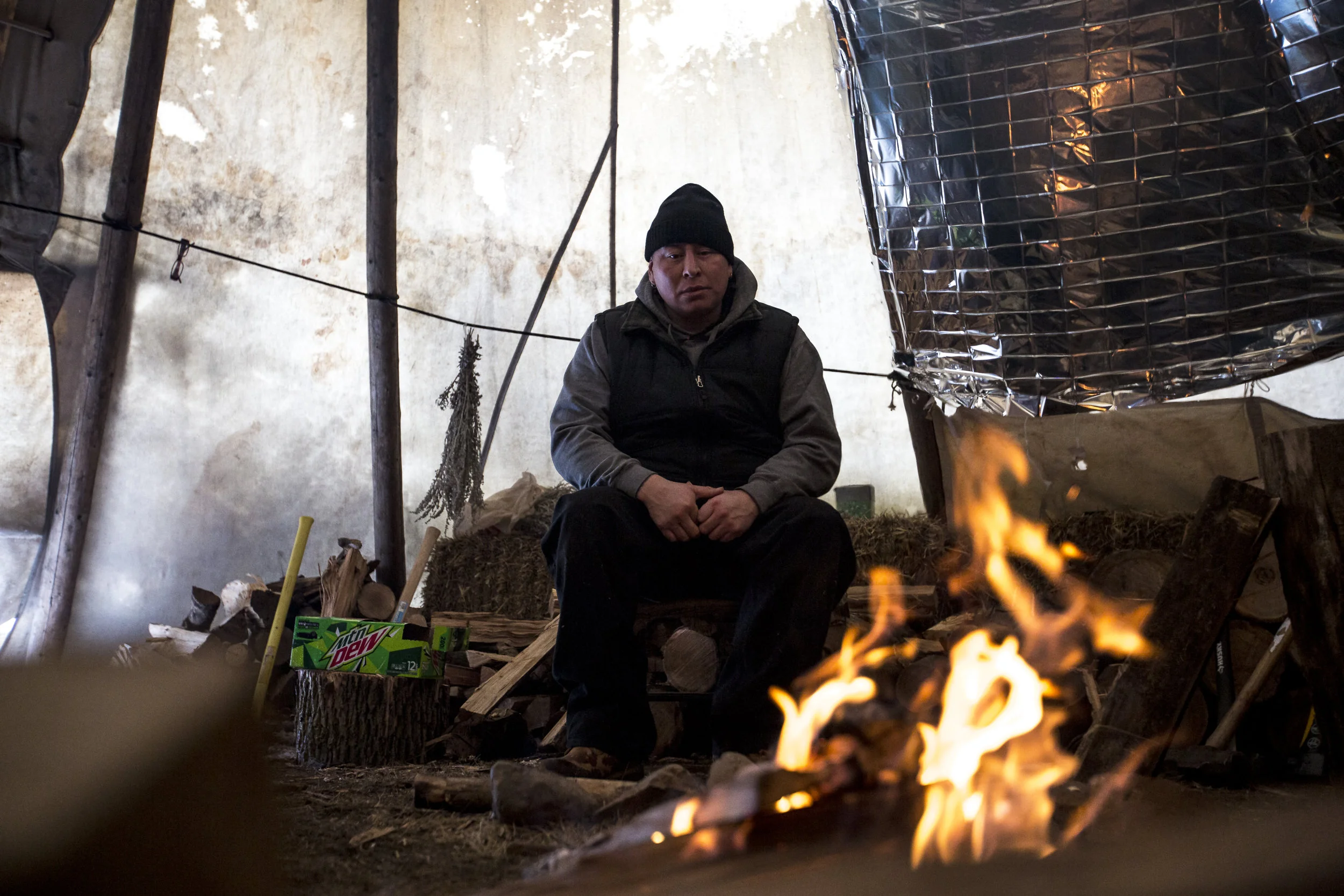 Joey Powless lives on the Oneida Nation reservation with his two children. He helps maintain a sacred fire that has burned continuously since October. Addicts can come to the fire for support at any time.