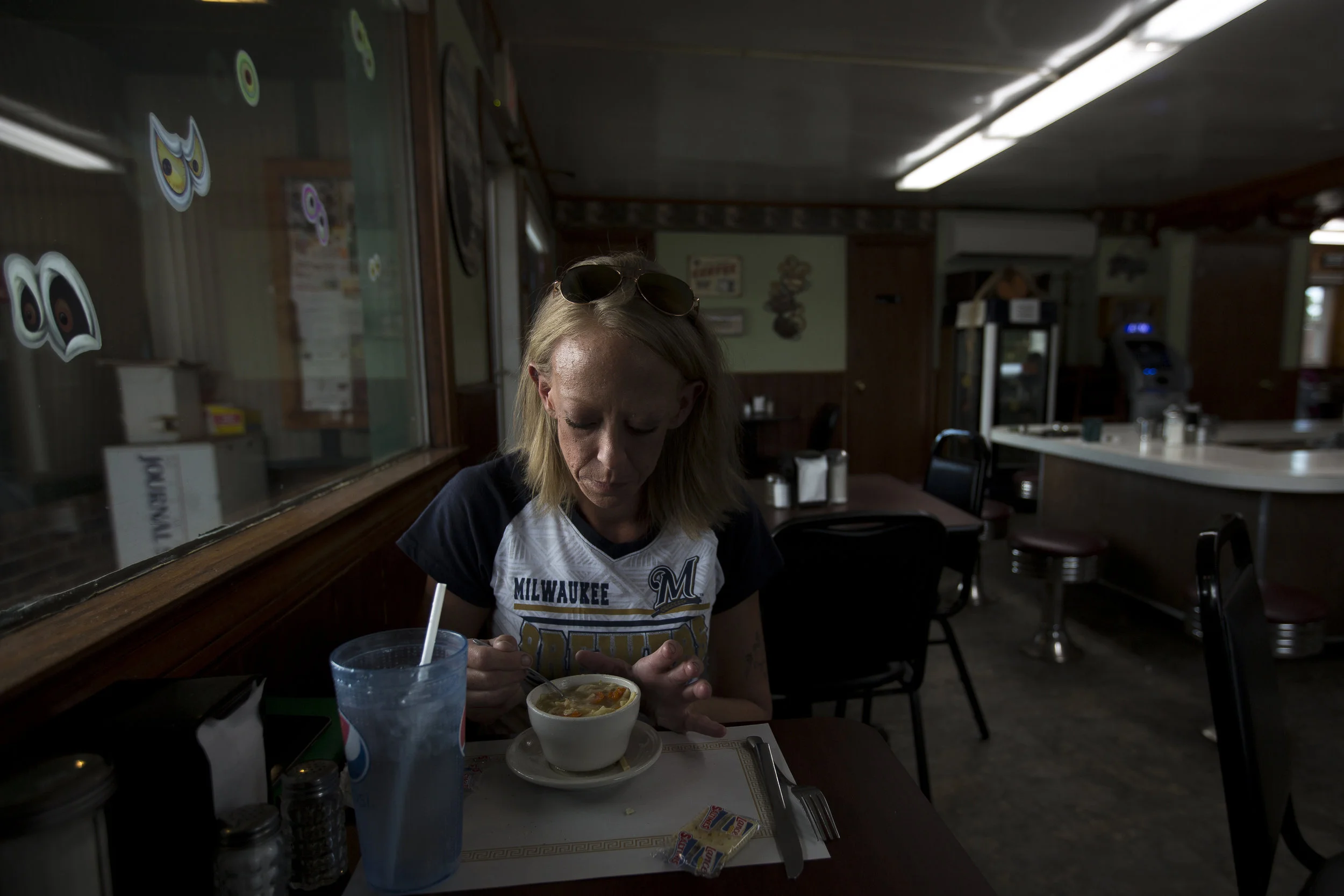 Jennifer Solis eats lunch at South Point Restaurant in Stevens Point, October 9, 2017. Solis lives at the Salvation Army in Stevens Point and works as a roofer when the weather allows. She hopes to go back to school for interior design.