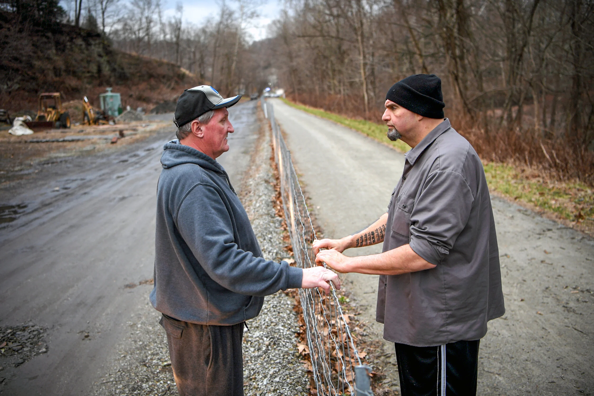  John Fetterman, right, then Lt. Gov.-elect of Pennsylvania and the mayor of Braddock, Pa., talks with Charles Prodanovich, of Trafford, Pa., who recognized Fetterman while he was on a walk with his family, Tuesday, Jan. 8, 2019, on the Westmoreland 