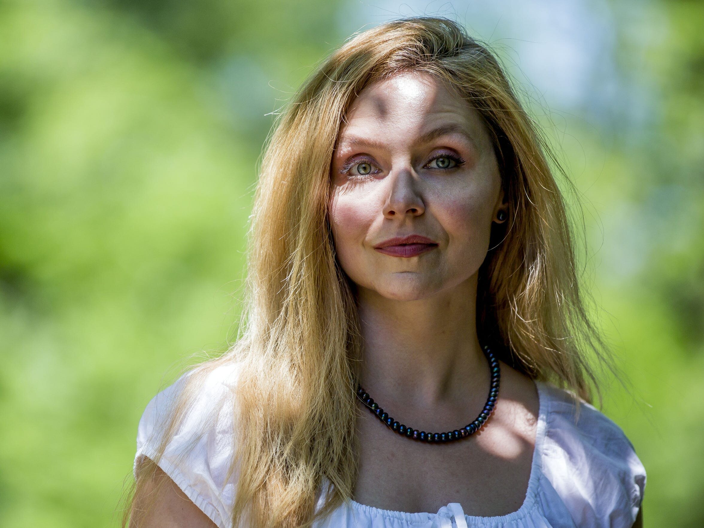 Jessica Strom, who served over two years in prison for attempting to hire someone to kill her fiance, poses for a portrait in Merrill, Wis., June 28, 2018. Ms. Strom says she endured years of abuse leading up to her crime.