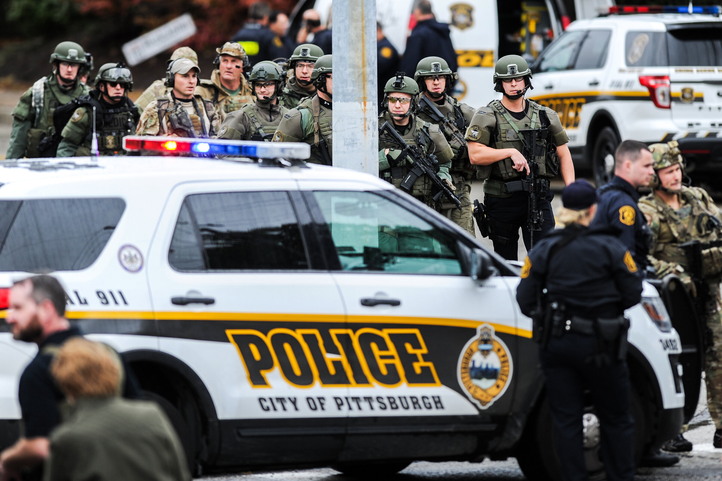  SWAT team officers work the scene where a gunman killed 11 people and injured six others, including four police officers, during the Shabbat morning service at the Tree of Life synagogue, Saturday, Oct. 27, 2018. 