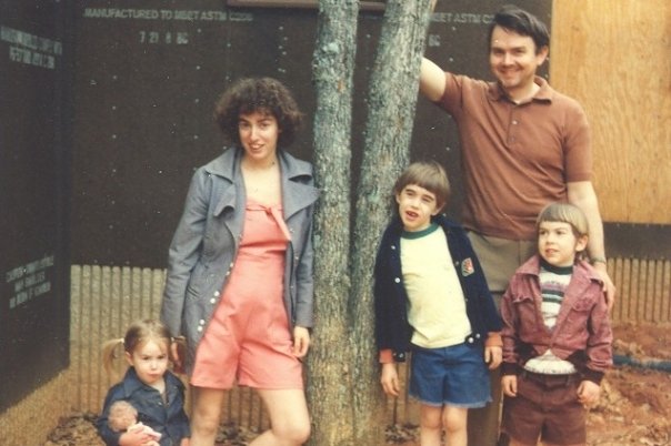 Visiting my mom's parents, when my grandfather was in the process of building their house. I had just turned 2 here. Kudos to my mom for trying out various hairstyles! And I think she made the clothes that she and I are wearing (including that jean jacket I have on).