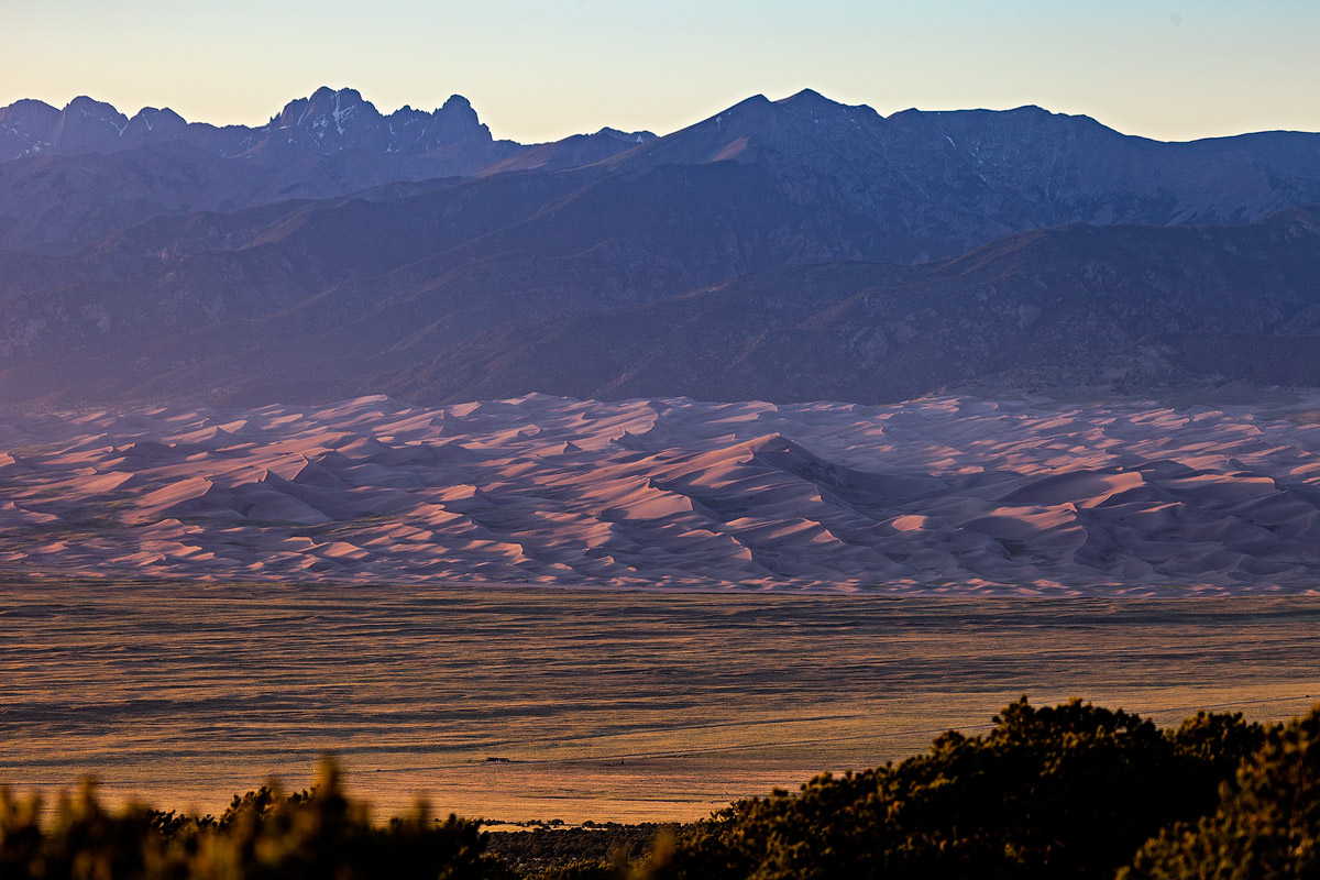 Star dune can be seen rising above the other sand dunes. taken from zapata falls trailhead at sunset