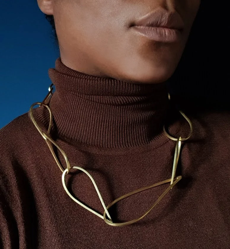 Flight necklace in gold 1.jpg