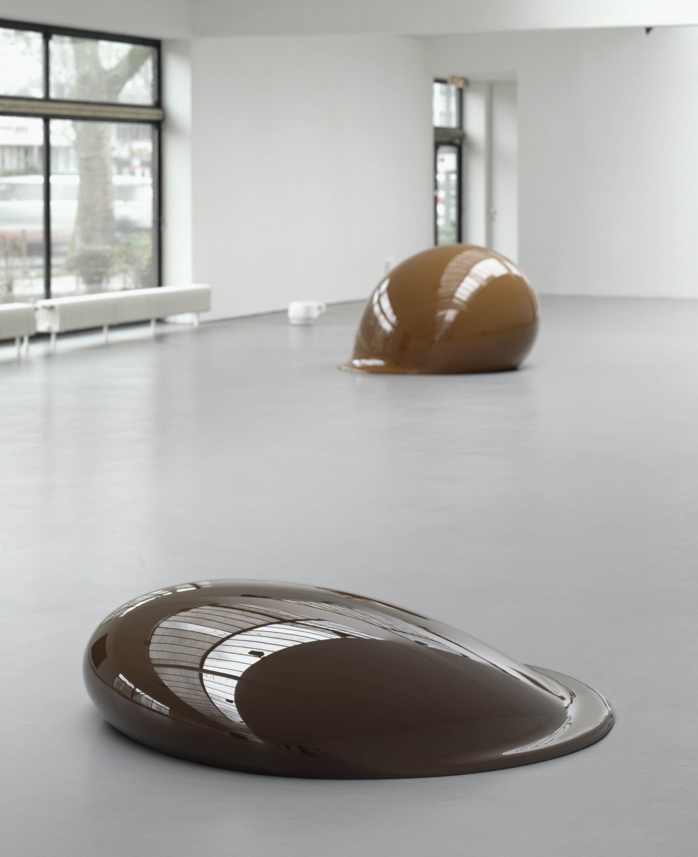 In the foreground: untitled, 1994, polyester resin,untitled, 1985 multiple sockets dimensions variable 38 x 160 x 149 cm