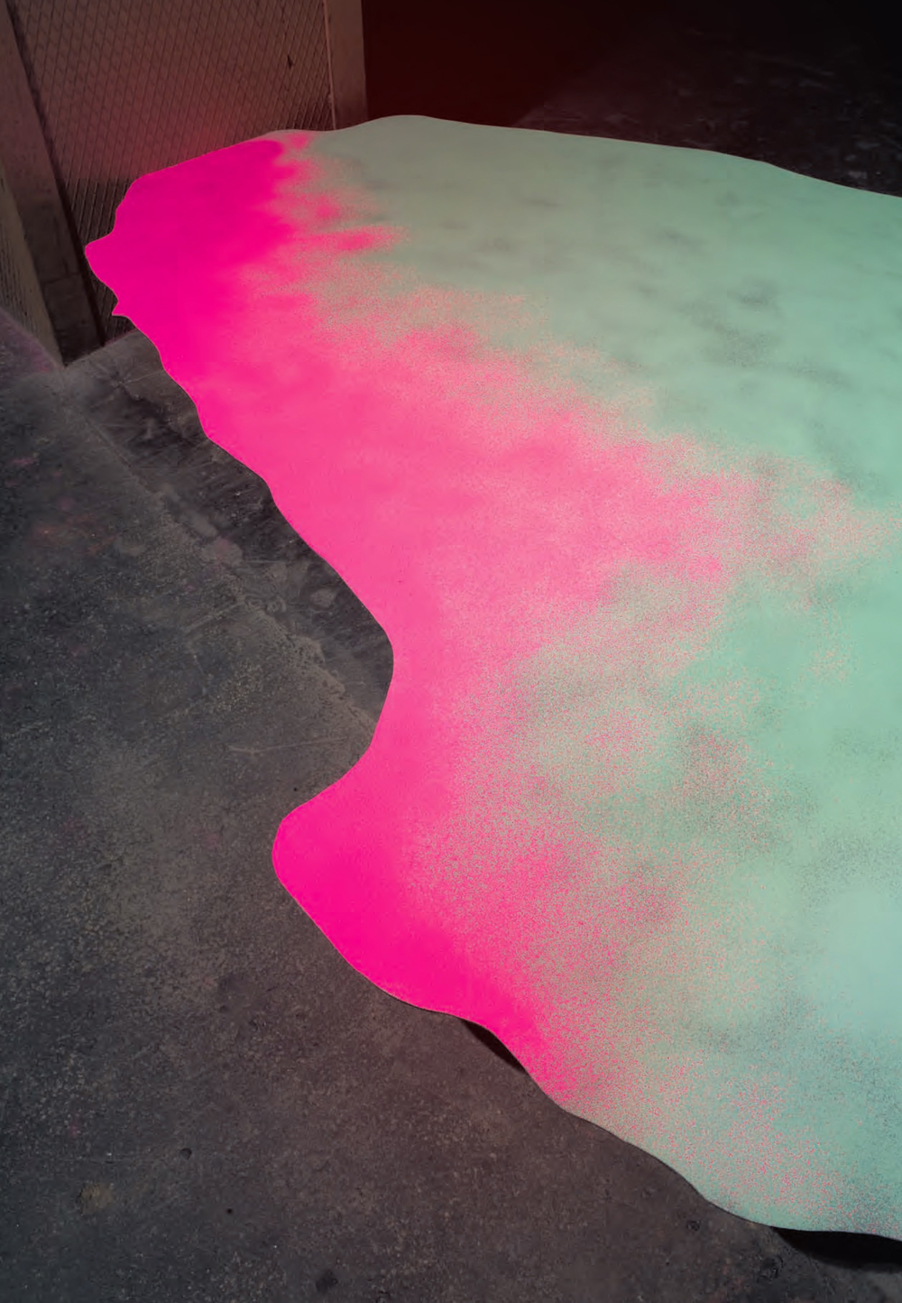 Una, otra y otra vez a la vez, 2014, site-specific for “Tabacalera. Espacio para el Arte” Pieces of wood hold in between two pillars and covered with florescent pigments, variable dimensions